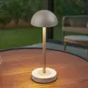 Image de Lampe à poser LED rechargeable Lindby Pippin, doré/travertin, IP44
