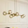 Image de Lindby suspension Isamer, gris fumé, 130 cm, sphère