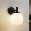 Image de Applique d'extérieur Lindby Dangan, noir/blanc, verre, Ø 20 cm