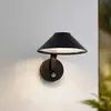 Image de Applique murale LED Lindby Capelo, noir, métal, capteur, Ø20cm