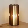 Image de Lampe sur pied Lucande Juneta, 75 cm, marron, bois, textile