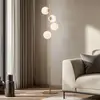 Image de Lampe sur pied Lucande Isandro, opale/or, à 4 lampes, verre/métal