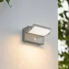 Image de Applique d'extérieur LED Lindby Sherin, gris clair, orientable, avec détecteur
