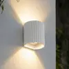 Image de Applique d'extérieur LED Lindby Ralino, blanche, à 2 lampes, IP65