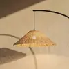 Image de Lampadaire d'extérieur Lucande Taniola, conique, rotin, 195 cm, IP44