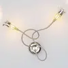 Image de Serien Lighting Applique de designer Poppy avec des pétales