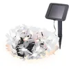 Image de Guirlande lumineuse solaire 30 LED avec papillons Couleur de la lumière : blanc chaud 3000 K Grand panneau solaire Longueur du câble : 11 m Guirlande lumineuse de jardin Décoration de fête