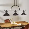 Image de QUOIZEL Suspension Emery style industriel bronze 3 lampes