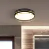 Image de Searchlight Plafonnier Phoenix, Ø 30 cm, noir / laiton, IP44