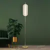 Image de Searchlight Lampe sur pied LED Capsule, couleur laiton, fer, acrylique