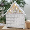 Image de Ginger Ray Calendrier de l'Avent lumineux en bois blanc et doré pour cheminée