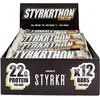 Image de Styrkr thon Lot de 12 barres protéinées STYRKR   Lot de 12 à 23 g de protéines   Faible teneur en sucre seulement 1,6 g   Saveur beurre d'arachide et chocolat   Végétalien et sans gluten   Approuvées