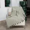 Image de Febronie - Plaid en coton Megève vert olive 160x250 cm