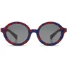 Image de KOMONO Lele JR. Lunettes de soleil rondes Red Jungle pour enfants avec protection UV et lentilles résistantes aux rayures, pour bébés, tout-petits, filles et garçons unisexes âgés de 1 à 2 ans
