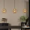 Image de Lucide Suspension Danza, à 3 lampes, allongée, dorée