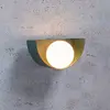 Image de Lucide Applique Benni abat-jour sphérique en verre, verte