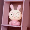 Image de Lucide Lampe de table pour enfants Dodo lapin, rose/blanc, intensité variable, ABS
