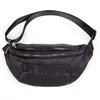 Image de Sac banane On the go matelasse noir - Childhome