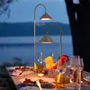 Image de FRANDSEN Lampadaire LED rechargeable Grasp, couleur laiton, hauteur 72 cm