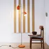 Image de Lampadaire Ocean de Dyberg Larsen, orange, hauteur 160 cm, à 2 lampes.