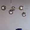 Image de Dyberg Larsen Como suspension, à 5 lampes, laiton