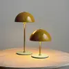 Image de Dyberg Larsen lampe à poser LED rechargeable Along, curry, lot de 2