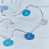 Image de Sirius Guirlande lumineuse LED Selma Clam, bleue, 20 ampoules, fonctionnement à piles