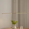 Image de Suspension LED UMAGE Omni, couleur laiton, longueur 107 cm, à 2 lampes.