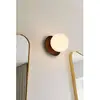 Image de Nuura Aps Applique murale Nuura Liila 1, IP44, Ø 16,5 cm, bronze/opale