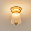 Image de Nuura Aps Plafonnier LED Nuura Asteea, Ø 12 cm, couleur laiton/transparent