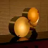 Image de Lampe à poser Gubi Coppia, ivoire/rosé, acier, hauteur 42 cm