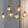 Image de EMIBIG LIGHTING Suspension Glassy, à 6 lampes, noir, ambre, verre, 75 cm