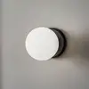 Image de EMIBIG LIGHTING Applique murale Kiba, noir/doré, abat-jour boule en verre