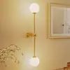 Image de ALDEX Applique murale Alison, à 2 lampes, laiton/blanc, 89 cm