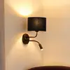 Image de Duolla Applique murale Roller, velours bleu foncé, noir, avec lampe de lecture