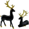Image de HOZZAVOX Ensemble de 2 Figurines décoratives de Noël représentant des Rennes, des Cerfs et des élans. Grandes Sculptures animales en résine(A)