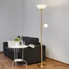Image de Lindby lampadaire Elaina, lampe de lecture, couleur laiton, 183cm E27