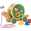 Image de Jouet à tirer Escargot roulant en bois avec jeu de formes Hape®