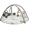 Image de Tiny Love Classic Gymini, Tapis d’éveil musical 2-en-1 pour bébé, dès la naissance, gym pour bébé, 20 activités, jouet musical interactif, arches ajustables, Black & White Décor