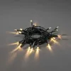 Image de Konstsmide 1469-100 Guirlande lumineuse LED, avec interrupteur marche/arrêt, minuterie 6 h, 30 diodes blanc chaud, fonctionnement à piles, pour l'intérieur, câble vert, 3 piles AA 1,5 V (non incluses)