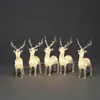 Image de Konstsmide 6288-103 Lot de 5 rennes LED en acrylique transparent pour extérieur (IP44) 40 diodes blanc chaud 24 V Câble blanc chaud