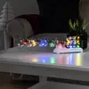 Image de Konstsmide Christmas Déco table Bonhomme de neige traîneau LED colorées