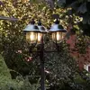 Image de Konstsmide Lampadaire d'extérieur Parma à 3 lampes avec toit en acier inoxydable