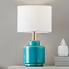 Image de Markslöjd Lampe de table Cous en textile avec pied en céramique