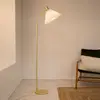 Image de Markslöjd Lampe sur pied textile Mira, laiton
