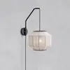 Image de Markslöjd Applique murale Asuka, Ø 27 cm, beige/noir, tissu/métal