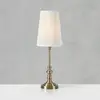 Image de Markslöjd Lampe de table Noble, couleur laiton/blanc naturel, hauteur 56 cm, tissu