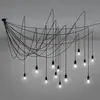 Image de SELETTI Suspension LED Maman noire 14 lampes transparente