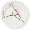 Image de Seletti Kintsugi Assiette à fruits en porcelaine et or 24 carats mod. 1