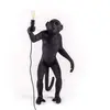Image de Seletti Lampe singe en résine 60 x 52,5 x 33 cm noir